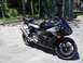 2008 Yamaha R1 - Black Yamaha R6 sportbike parked outdoors, showing the front 3/4 view.