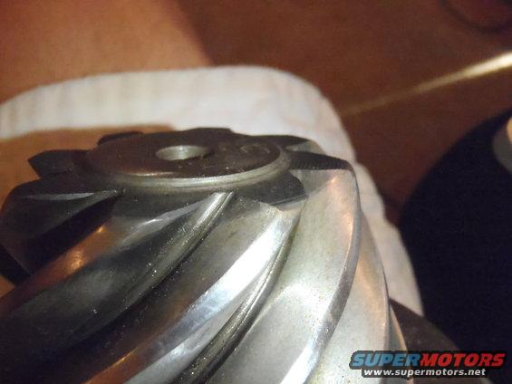 Close-up of a metal differential gear with visible teeth