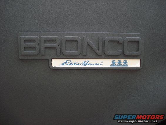 Bronco Eddie Bauer emblem on dark textured surface