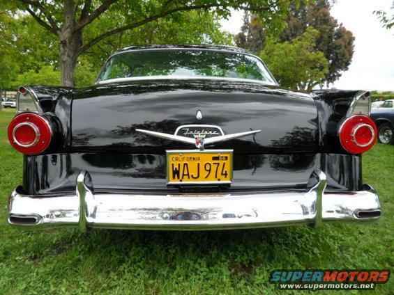 Black 1956 Ford Fairlane rear view with California license plate WAJ 974