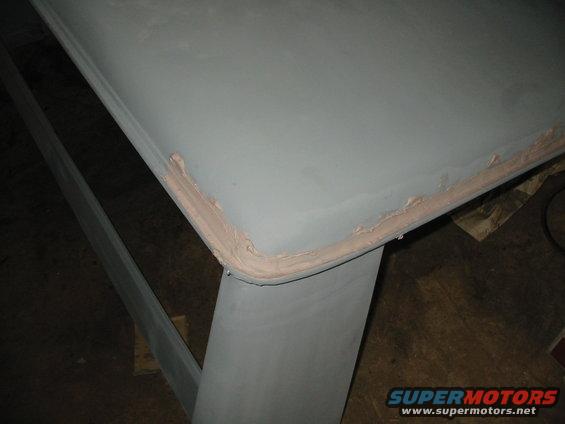 raes-bronco-2-038.jpg putty knife was not working in the channel, but if you use your finger to wipe the bondo in... looks perfect