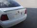 2001 Volkswagen Jetta - White 2001 Volkswagen Jetta rear view with spoiler and 'JETTA' badging.