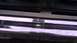 1984 Ford Bronco - Close-up of the front grille and chrome bumper of a 1984 Ford Bronco.