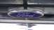1984 Ford Bronco - Close-up of a Ford emblem on a vehicle's front grille, suggesting a model from the early 1980s.