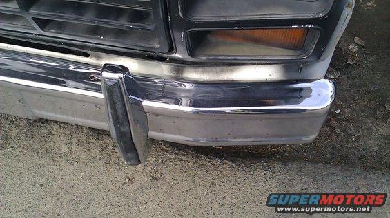 Front bumper and grille of an older truck, possibly 1980s era