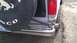 1984 Ford Bronco - Rear view of a Ford Bronco, showing the spare tire cover and chrome bumper.