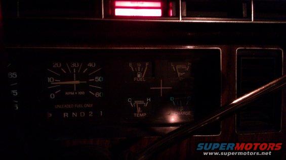 1984 Ford Bronco dashboard with tachometer, fuel, temp, and charge gauges