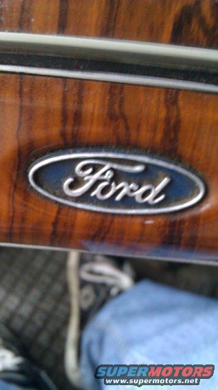 Ford emblem on wood-grain interior trim