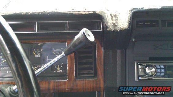 1984 Ford Bronco interior showing dashboard, fuel gauge, charge gauge, and gear shifter