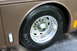2003 Ford F-350 - Close-up of a vehicle's side shows a chrome wheel and a Michelin tire with size 275/80R22.5.