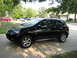 2009 Nissan Murano - Black 2009 Nissan Murano parked on a suburban driveway.