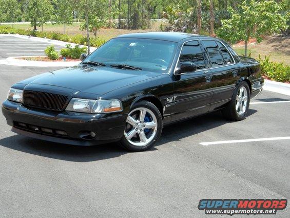 Black 2003 Mercury Marauder parked in a lot, front 3/4 view