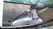 1999 Ford Expedition - Close-up view of a vehicle's headlight assembly near the radiator.