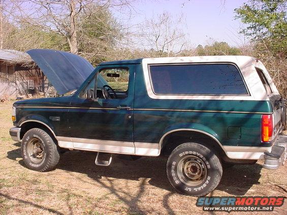 Green 1992 Ford Bronco side view with hood open