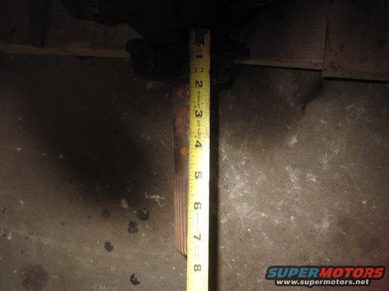 measuring a splined metal shaft with a tape measure