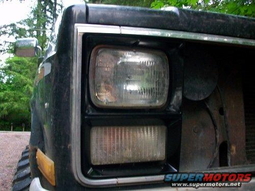 1983 Chevrolet C/K Pickup front corner with headlight and turn signal visible