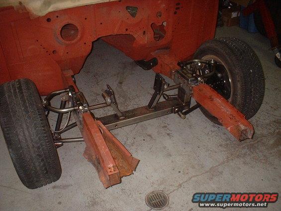 I threw a couple of old 16" tires mounted on FWD Lincoln wheels just to roll it around. FWIW... the center pilot diameter on these rotors is ~2 1/2" where most older FoMoCo wheels are ~2 1/4". Still the same 5 on 4 1/2" BC though.