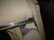 1983 Ford Bronco - Body panel shows signs of repair work, including primer and metal filler.