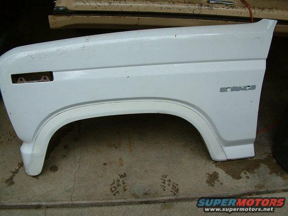 White Ford Bronco fender with 'BRONCO' badge visible