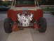 1964 Ford Fairlane - The front end of a vehicle project, displaying a newly installed V8 engine and chassis components.