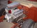 1964 Ford Fairlane - Engine and front suspension parts are visible in this close-up view of a vehicle's chassis.