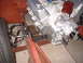 1964 Ford Fairlane - Close-up view of engine and suspension components, likely during a restoration or build process.