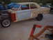 1964 Ford Fairlane - This 1964 Ford Fairlane is undergoing restoration, with its engine bay open and body panels prepped.