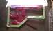 1994 Ford F-250 - The interior of a red vehicle door shell is shown with masking tape applied.