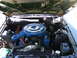 1971 Mercury Cyclone - Engine bay of a 1971 Mercury Cyclone, its V8 engine and blue air cleaner assembly.