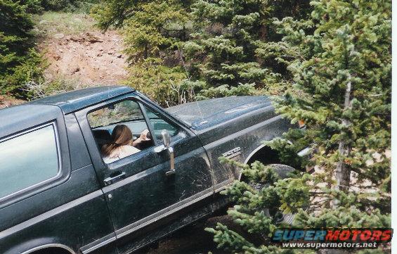 My girlfriend seen holding on for her life. As i bend my exaust pipes backing down this hill.