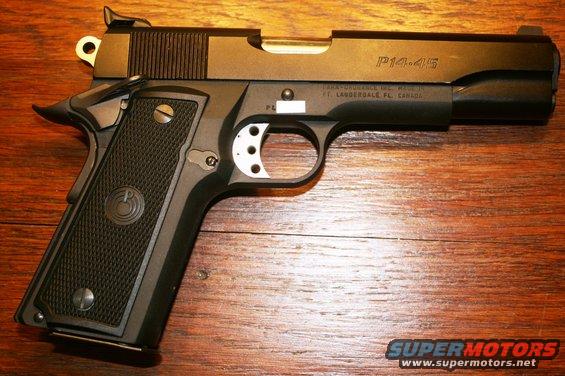 P14.45 pistol with Para-Ordnance markings on wooden surface