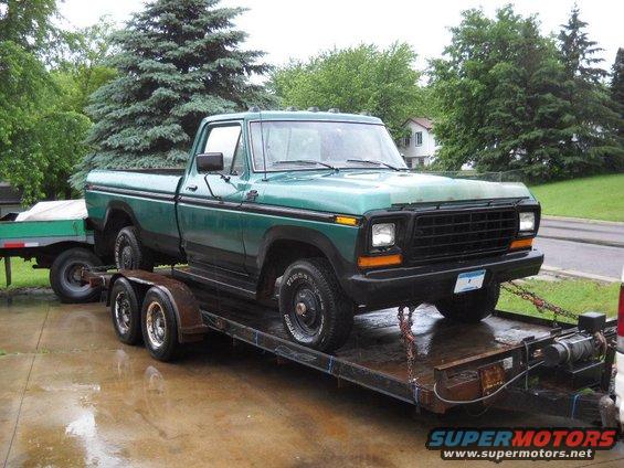 1978-f150-4x4-6182011-003.jpg 6-18-2011:   Well here's a little update. I bought another donor truck!!!   Back in April I decided to go back to a 300 inline 6. I sold my 351W shortly after. The 300 is one of my favorite engines and it will give me a little more driver side leg room.

I've been looking for a donor truck to get a good engine for it. I found a few and the deals fell thru.  Yesterday I found one and today I went and checked it out. It looked good to me and I bought it and hauled it home.

I think I've got a damn good deal on this. It's a 1978 Ford F150 Ranger XLT Lariat 4x4. It has a 300, NP435 4spd, NP205 transfercase, 9" rear ( 3.50 gears ) and D44 front. It's got some rust, but the chassis is solid and it runs and drives. It does have some minor issues like a low brake pedal, clutch linkage needs adjusting, there are also plenty of oil leaks.  It started right up and ran decent. Good power, no smoke or bad noises. But it does need a little carb work and could use a tune up.

The guy I bought it from and his son decided to scuff and black out all the trim. :( I like the look but it ruined a lot of straight trim that I could have made some cash on selling.:-arrgh Now it's just more scrap. They also removed and tossed the lower body trim and used bedliner on the lower portion of the body.

Anyways here's my newest purchase. Oh yea, I paid $500 for it!:D





Since I've got my diesel for towing I'm seriously thinking about using the entire chassis from this truck for the 54.  I'll slide the rear diff forward 23", have the rear driveshaft shortened and call it good. 

This truck has everything I want and it's driveable.  So instead of having to make a new transmission crossmember, make new rear frame crossmembers, mess with trying to work around the front leaf springs, I can just use this chassis. The coil spring front suspension will make fitting the front clip tons easier. 

So I'm starting over again on the chassis!  My plan on this one is to just leave it together, get plates and insurance on it. I'll drive it around and figure out any issues it might have and fix them as I can. Once I get the 54 cab and front clip buttoned up and done I will pull the body off the 78. Then I can move the rear diff/suspension forward, clean everything up and paint it all. I plan to replace the suspension bushings, shocks, brake pads and shoes and fix any leaks ( plenty of them ) .  

Well that is this years plans. At least until I change my mind again.:D