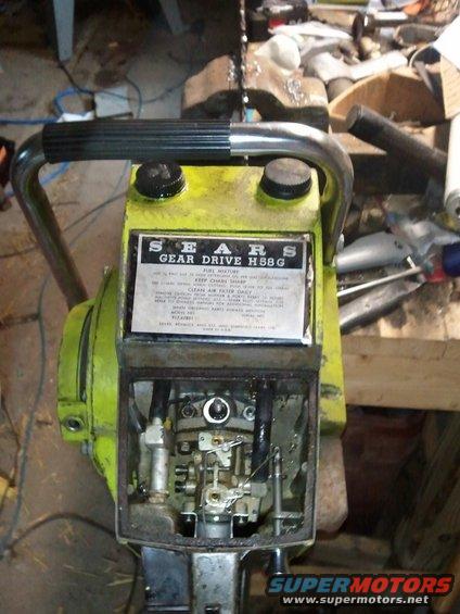 Yellow Sears Gear Drive H58G chainsaw with exposed engine components