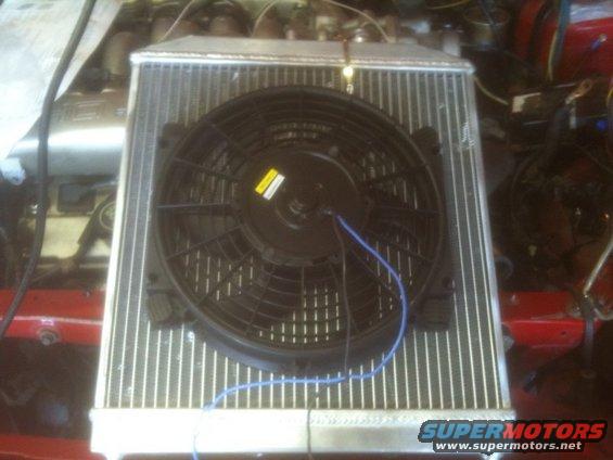 Radiator and electric fan assembly in engine bay