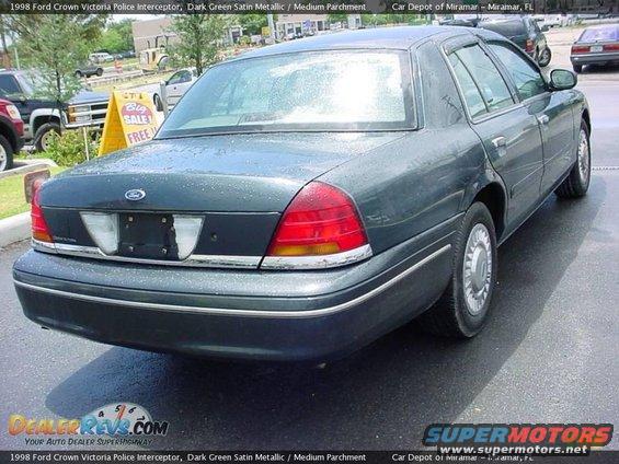 Dark green 1998 Ford Crown Victoria rear view