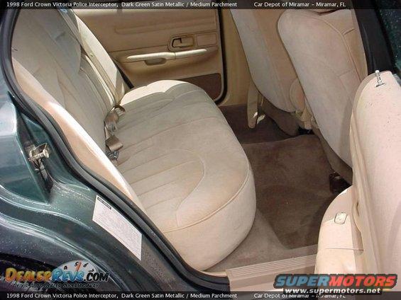 1998 Ford Crown Victoria interior showing tan seats and door panel