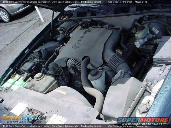 1998 Ford Crown Victoria engine bay, dark green exterior