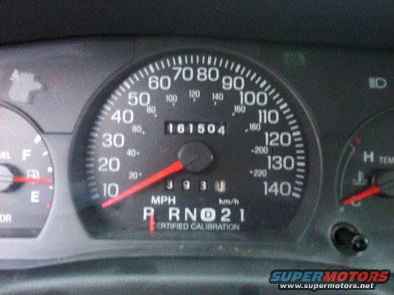 Speedometer reads 161,504 miles. Gear selector shows P, R, N, D, 2, 1