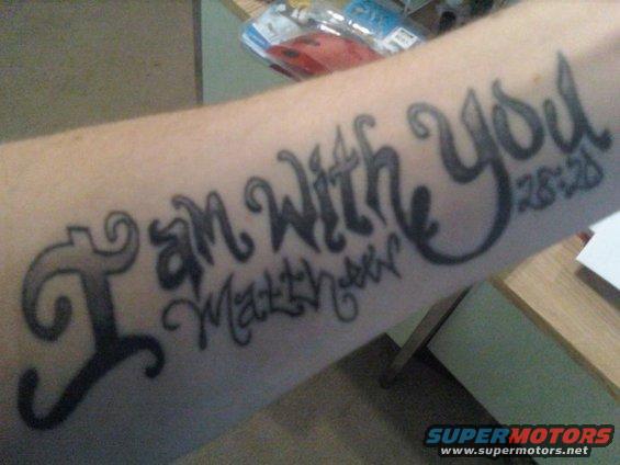 tattoo of 'I am With You' and 'Matthew 28:20' on an arm