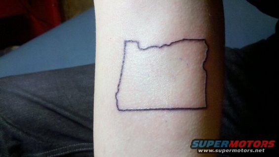 Oregon state outline tattoo on arm