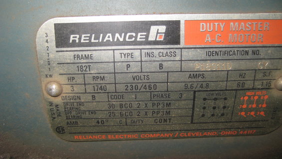 Motor nameplate with Reliance logo, Duty Master A-C Motor text, and technical specifications