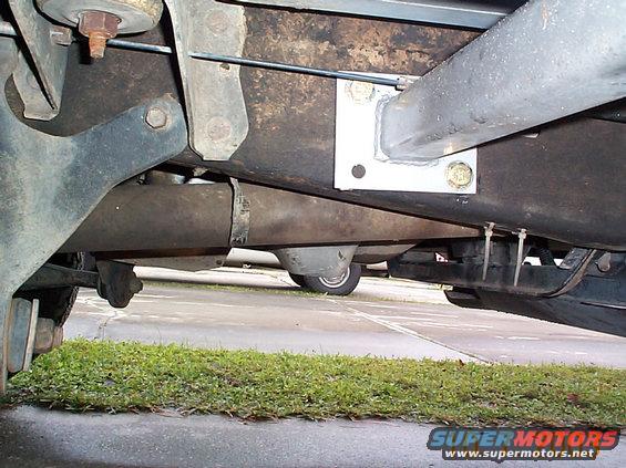 driversidefront.jpg driver's side front pad mount. There is a fuel line bracket that runs behind this mount, bolts to the brack must be removed and the bracket pushed out of the way.