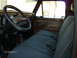 1979 Ford F-150 - Interior of a 1979 Ford F-150 pickup truck, the original steering wheel and seat upholstery.