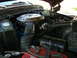 1979 Ford F-150 - Close-up view of the engine compartment, showing various components and hoses.