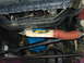 1979 Ford F-150 - Close-up view of a Superlift steering stabilizer and associated suspension components on a vehicle.