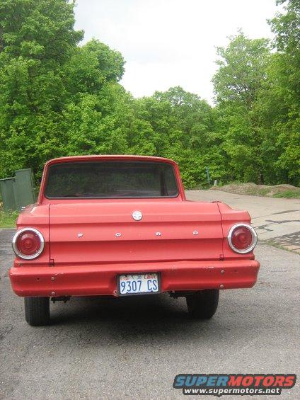 1964 Ford Ranchero rear view with red paint and license plate 9307 CS