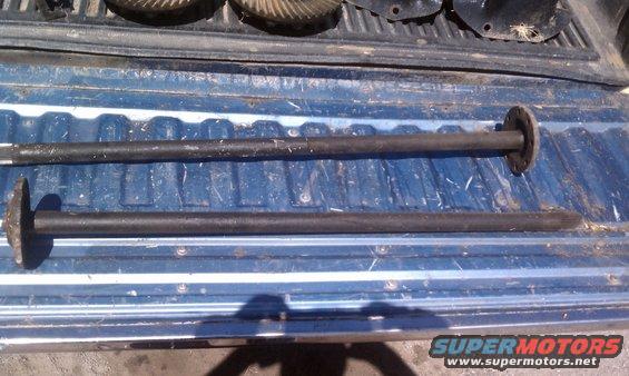 Two axles with flanges in a truck bed