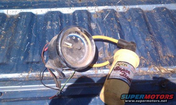 ACCEL Super Coil and a tachometer with yellow wire