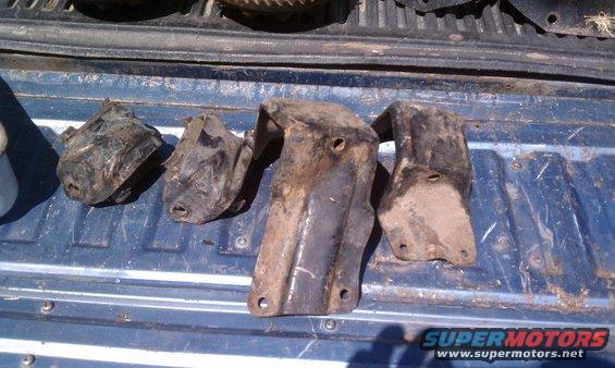 Four engine mounts on a truck bed