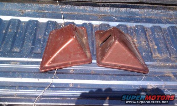 Pair of brown plastic corner pieces with slots